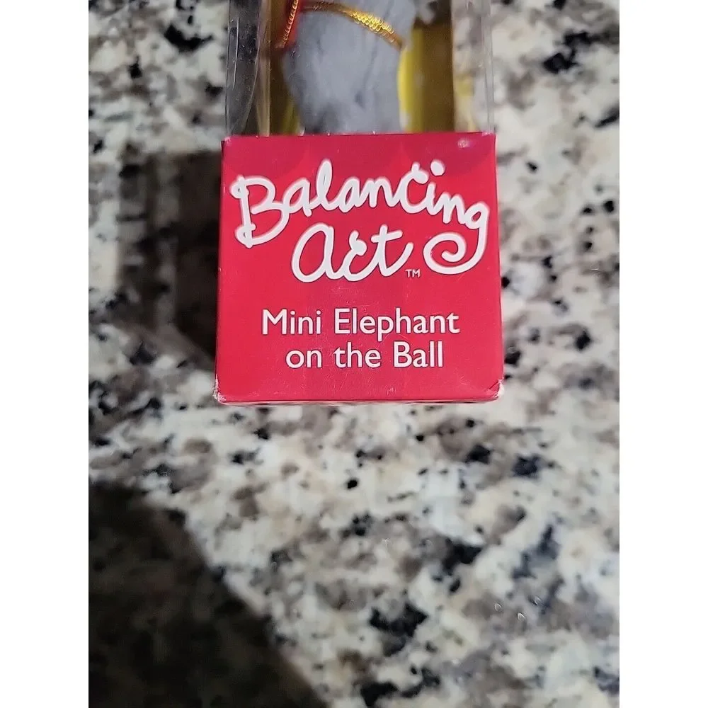 Balancing Act Mini Elephant On‎ Ball